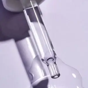 Best bakuchiol serum dropper bottle lavender background natural anti-aging skincare retinol alternative botanical formulation clinical strength serum drops