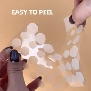 Woman hand holding Pimple Patch Rx sheet peeling individual patches professional acne treatment application hydrocolloid salicylic acid calendula tea tree oil convenient peel-off sheet
