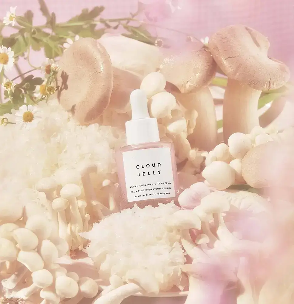 Best ultra hydration serum Sigma Essentials pink serum bottle floral background clinical strength moisture therapy dry skin anti-aging